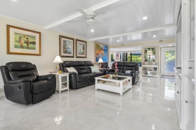 Located on the coveted first floor, convenience is at your on Quail Ridge Golf Course and Country Club in Florida - for sale on GolfHomes.com, golf home, golf lot