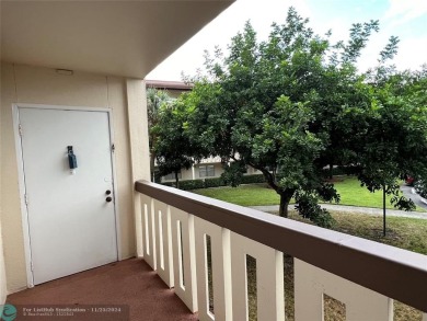BACK ON MARKET 2nd FLOOR CORNER with WIDE GOLF/LAKE/POOL VIEW on Wynmoor Golf Course in Florida - for sale on GolfHomes.com, golf home, golf lot