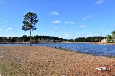 Unique lake front homesite with over 180degree water view on Hilton Head Lakes Golf Club in South Carolina - for sale on GolfHomes.com, golf home, golf lot