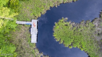 Elevated, large lot next to the trails and boardwalk. X flood on Minnesott Golf and Country Club in North Carolina - for sale on GolfHomes.com, golf home, golf lot