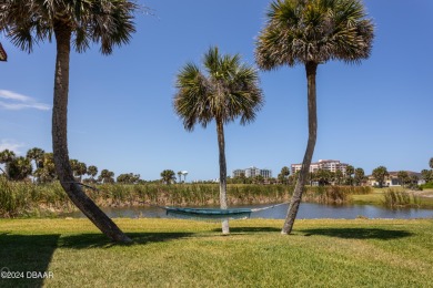 SPECTACULAR RIVERFRONT CONDO VILLA WITH BEACH, WATERWAY, POOL on Ocean Palm Golf Course in Florida - for sale on GolfHomes.com, golf home, golf lot