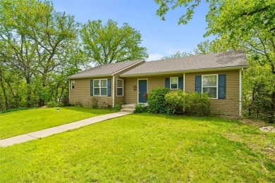 You will not be disappointed when you step into this well built on Linn Valley Lakes - Deer Trace Golf Course in Kansas - for sale on GolfHomes.com, golf home, golf lot
