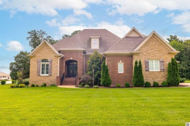 Ready for luxury living in this beautifully maintained 5-bedroom on Country Club of Paducah in Kentucky - for sale on GolfHomes.com, golf home, golf lot