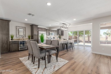 STUNNING REMODEL featuring RAISED CEILINGS, luxury wood-look on Sun Lakes Country Club in Arizona - for sale on GolfHomes.com, golf home, golf lot
