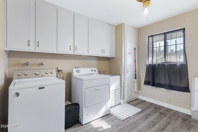 Beautifully updated and truly move-in ready, this Sun City home on Sun City Lakes West and East in Arizona - for sale on GolfHomes.com, golf home, golf lot