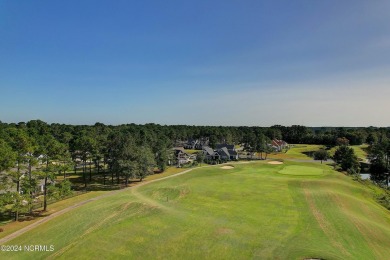 Welcome to coastal living at its finest in Crow Creek! This on Crow Creek Golf Club in North Carolina - for sale on GolfHomes.com, golf home, golf lot