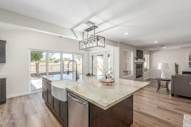 STUNNING REMODEL featuring RAISED CEILINGS, luxury wood-look on Sun Lakes Country Club in Arizona - for sale on GolfHomes.com, golf home, golf lot
