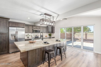 STUNNING REMODEL featuring RAISED CEILINGS, luxury wood-look on Sun Lakes Country Club in Arizona - for sale on GolfHomes.com, golf home, golf lot