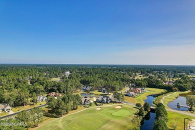 Welcome to coastal living at its finest in Crow Creek! This on Crow Creek Golf Club in North Carolina - for sale on GolfHomes.com, golf home, golf lot