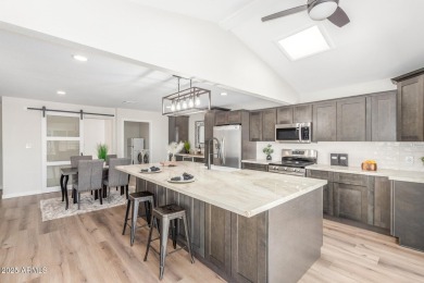 STUNNING REMODEL featuring RAISED CEILINGS, luxury wood-look on Sun Lakes Country Club in Arizona - for sale on GolfHomes.com, golf home, golf lot