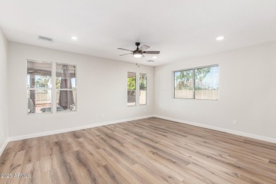 STUNNING REMODEL featuring RAISED CEILINGS, luxury wood-look on Sun Lakes Country Club in Arizona - for sale on GolfHomes.com, golf home, golf lot