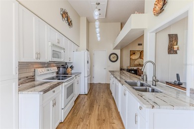 Desirable end-unit villa offering 2 bedrooms, 2 bathrooms, and a on Timber Pines Golf Course in Florida - for sale on GolfHomes.com, golf home, golf lot