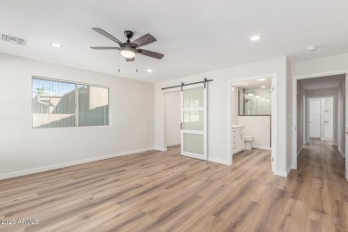 STUNNING REMODEL featuring RAISED CEILINGS, luxury wood-look on Sun Lakes Country Club in Arizona - for sale on GolfHomes.com, golf home, golf lot