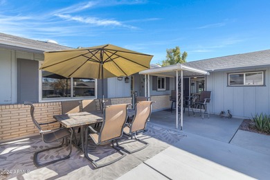 Beautifully updated and truly move-in ready, this Sun City home on Sun City Lakes West and East in Arizona - for sale on GolfHomes.com, golf home, golf lot