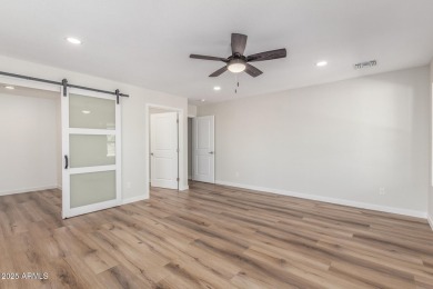 STUNNING REMODEL featuring RAISED CEILINGS, luxury wood-look on Sun Lakes Country Club in Arizona - for sale on GolfHomes.com, golf home, golf lot