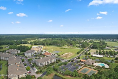 Welcome to coastal living at its finest in Crow Creek! This on Crow Creek Golf Club in North Carolina - for sale on GolfHomes.com, golf home, golf lot