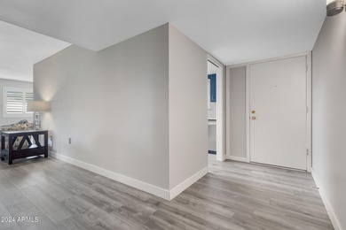 Beautifully updated and truly move-in ready, this Sun City home on Sun City Lakes West and East in Arizona - for sale on GolfHomes.com, golf home, golf lot