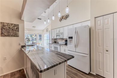 Desirable end-unit villa offering 2 bedrooms, 2 bathrooms, and a on Timber Pines Golf Course in Florida - for sale on GolfHomes.com, golf home, golf lot