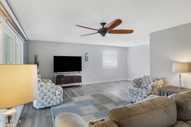 Beautifully updated and truly move-in ready, this Sun City home on Sun City Lakes West and East in Arizona - for sale on GolfHomes.com, golf home, golf lot
