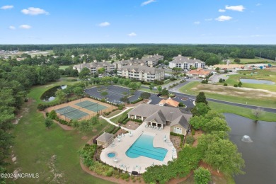 Welcome to coastal living at its finest in Crow Creek! This on Crow Creek Golf Club in North Carolina - for sale on GolfHomes.com, golf home, golf lot