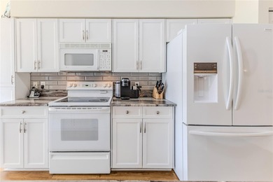 Desirable end-unit villa offering 2 bedrooms, 2 bathrooms, and a on Timber Pines Golf Course in Florida - for sale on GolfHomes.com, golf home, golf lot