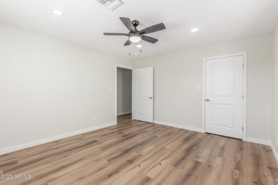 STUNNING REMODEL featuring RAISED CEILINGS, luxury wood-look on Sun Lakes Country Club in Arizona - for sale on GolfHomes.com, golf home, golf lot