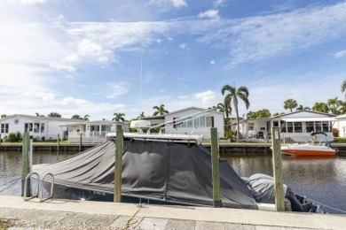 Imagine docking your 35 foot Boat behind your home. This on Windstar on Naples Bay in Florida - for sale on GolfHomes.com, golf home, golf lot