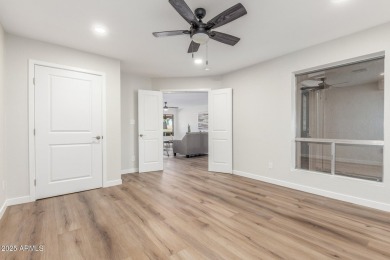 STUNNING REMODEL featuring RAISED CEILINGS, luxury wood-look on Sun Lakes Country Club in Arizona - for sale on GolfHomes.com, golf home, golf lot