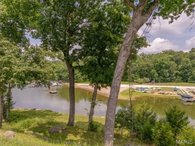 Welcome to 142 Geneva Cove on the stunning shores of LAKE ASPEN on Innsbrook Resort Golf Course in Missouri - for sale on GolfHomes.com, golf home, golf lot