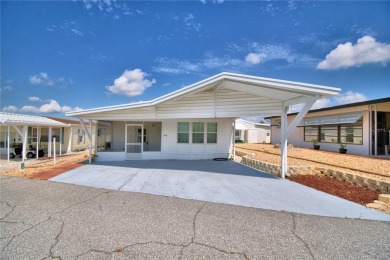 FLORIDA LIFESTYLE AT ITS BEST IN THIS HIGHLY DESIRABLE 55+ on Southern Dunes Golf and Country Club in Florida - for sale on GolfHomes.com, golf home, golf lot
