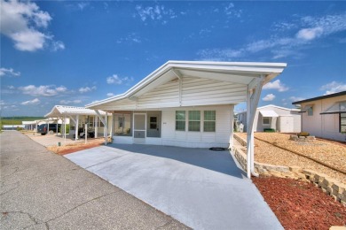 FLORIDA LIFESTYLE AT ITS BEST IN THIS HIGHLY DESIRABLE 55+ on Southern Dunes Golf and Country Club in Florida - for sale on GolfHomes.com, golf home, golf lot