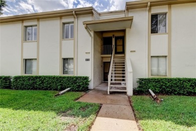 PRICED TO SELL!   This FIRST FLOOR condo located in desirable on East Lake Woodlands Country Club in Florida - for sale on GolfHomes.com, golf home, golf lot