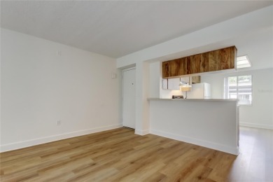 PRICED TO SELL!   This FIRST FLOOR condo located in desirable on East Lake Woodlands Country Club in Florida - for sale on GolfHomes.com, golf home, golf lot