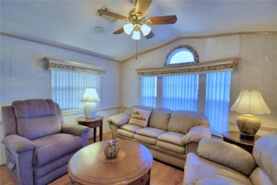 WELCOME TO YOUR FLORIDA RETIREMENT OASIS IN A GATED/GOLF CART on Southern Dunes Golf and Country Club in Florida - for sale on GolfHomes.com, golf home, golf lot