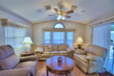 WELCOME TO YOUR FLORIDA RETIREMENT OASIS IN A GATED/GOLF CART on Southern Dunes Golf and Country Club in Florida - for sale on GolfHomes.com, golf home, golf lot