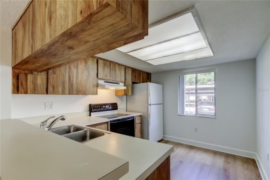 PRICED TO SELL!   This FIRST FLOOR condo located in desirable on East Lake Woodlands Country Club in Florida - for sale on GolfHomes.com, golf home, golf lot