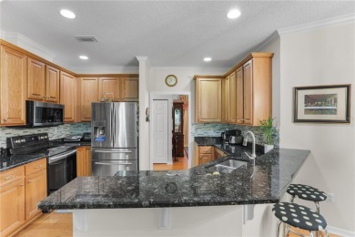 Discover this beautifully maintained 2005 custom-built residence on Turkey Creek Golf and Country Club in Florida - for sale on GolfHomes.com, golf home, golf lot