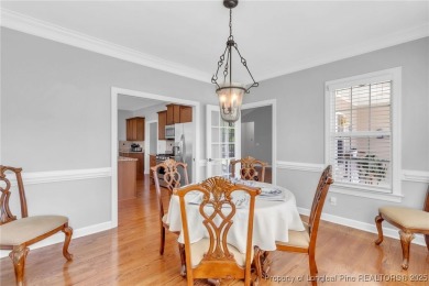 Discover this stunning 4-bedroom, 3-bath home located in the on Gates Four Golf and Country Club in North Carolina - for sale on GolfHomes.com, golf home, golf lot