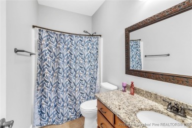 Discover this stunning 4-bedroom, 3-bath home located in the on Gates Four Golf and Country Club in North Carolina - for sale on GolfHomes.com, golf home, golf lot