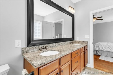 Discover this stunning 4-bedroom, 3-bath home located in the on Gates Four Golf and Country Club in North Carolina - for sale on GolfHomes.com, golf home, golf lot