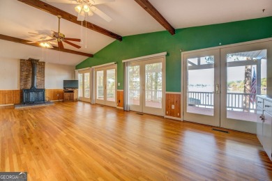Panoramic big water views from this charming DEEDED lakefront on Turtle Cove Golf Course in Georgia - for sale on GolfHomes.com, golf home, golf lot