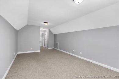 Discover this stunning 4-bedroom, 3-bath home located in the on Gates Four Golf and Country Club in North Carolina - for sale on GolfHomes.com, golf home, golf lot