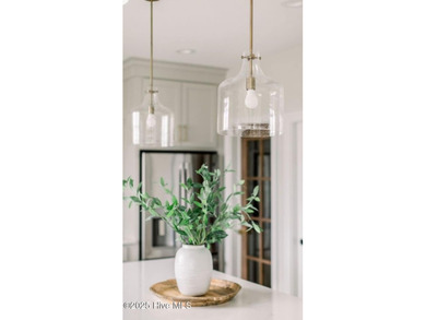 Welcome home to this amazing new construction home nearing on Lockwood Folly Country Club in North Carolina - for sale on GolfHomes.com, golf home, golf lot