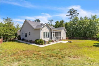 Discover this stunning 4-bedroom, 3-bath home located in the on Gates Four Golf and Country Club in North Carolina - for sale on GolfHomes.com, golf home, golf lot