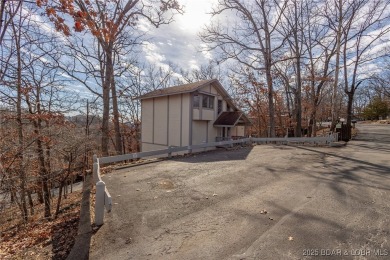 Are you dreaming of owning a Lake Home in Lake of the Ozarks? on The Oaks Golf Course in Missouri - for sale on GolfHomes.com, golf home, golf lot