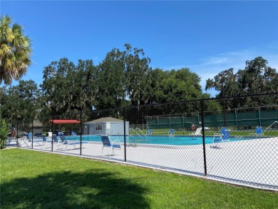 Discover this beautifully maintained 2005 custom-built residence on Turkey Creek Golf and Country Club in Florida - for sale on GolfHomes.com, golf home, golf lot