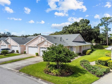 Welcome to this FULLY FURNISHED, END UNIT meticulously on Cypresswood Golf and Country Club in Florida - for sale on GolfHomes.com, golf home, golf lot