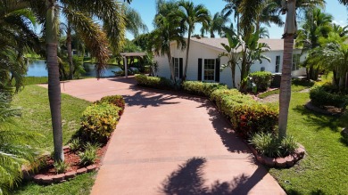 Absolutely stunning and one-of-a-kind corner lot with wraparound on Savanna Golf Club in Florida - for sale on GolfHomes.com, golf home, golf lot