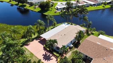 Absolutely stunning and one-of-a-kind corner lot with wraparound on Savanna Golf Club in Florida - for sale on GolfHomes.com, golf home, golf lot