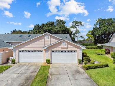 Welcome to this FULLY FURNISHED, END UNIT meticulously on Cypresswood Golf and Country Club in Florida - for sale on GolfHomes.com, golf home, golf lot